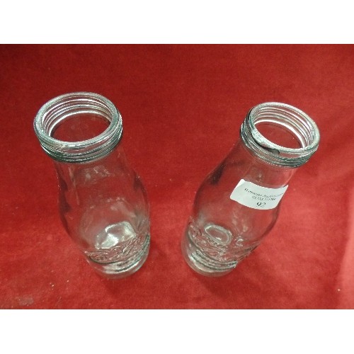 92 - PAIR OF VINTAGE GLASS COCA-COLA BRANDED PINT BOTTLES.