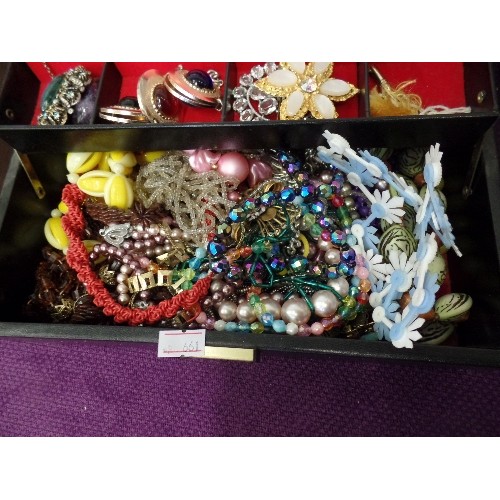 104 - COSTUME JEWELLERY, CONTAINED IN 2-TIER JEWELLERY BOX.