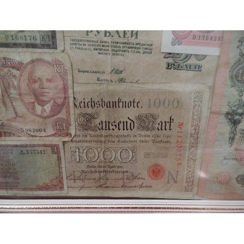 105 - GLAZED FRAME CONTAINING BANKNOTES FROM AROUND THE WORLD. MALAWI, MAURITIUS, REPUBLIC OF BIAFRA, ZAMB... 