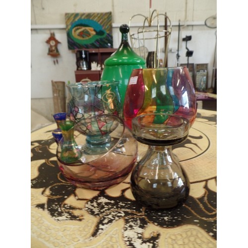 242 - COLOURFUL RETRO GLASSWARE. GREEN LIDDED VASE, PAINTED GLASS, MINIATURE VASES ETC.