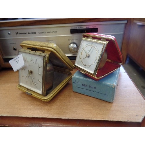 281 - A EUROPA 'MUSIC' TRAVEL ALARM CLOCK IN SHAGREEN CASE, & A TINY ESTYMA TRAVEL ALARM, WITH RED CASE, I... 