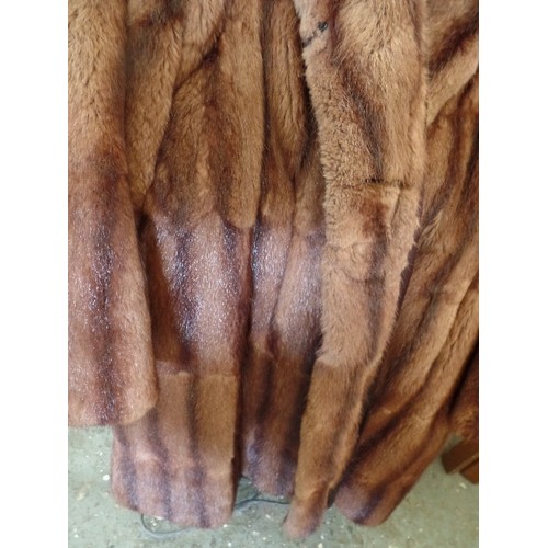 238 - BEAUTIFUL VINTAGE FUR COAT. VELVET-LINED POCKETS, AND 2 LARGE WOVEN-CORD BUTTONS.