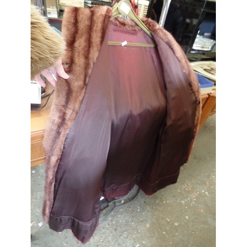 238 - BEAUTIFUL VINTAGE FUR COAT. VELVET-LINED POCKETS, AND 2 LARGE WOVEN-CORD BUTTONS.