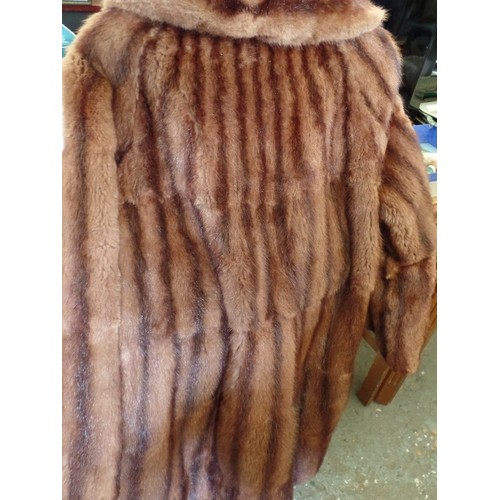 238 - BEAUTIFUL VINTAGE FUR COAT. VELVET-LINED POCKETS, AND 2 LARGE WOVEN-CORD BUTTONS.