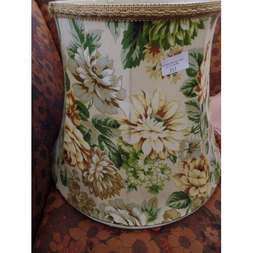 313 - 2 LARGE RETRO LAMPSHADES. A GREEN/GOLD FLORAL, AND A SALMON PINK.