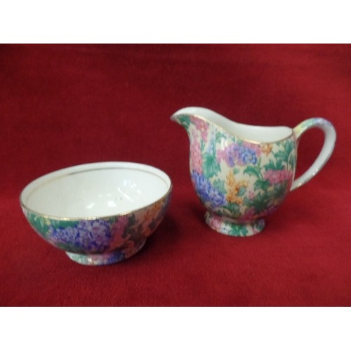 2 - A VINTAGE ROYAL WINTON CHINTZ PATTERN CREAM JUG AND BOWL AND AN EMPIRE WARE CHINTZ PLATE