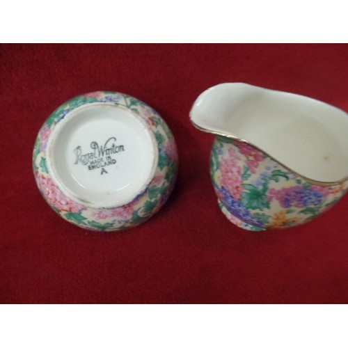 2 - A VINTAGE ROYAL WINTON CHINTZ PATTERN CREAM JUG AND BOWL AND AN EMPIRE WARE CHINTZ PLATE