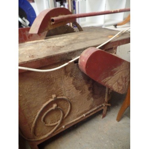 365 - LARGE VINTAGE WOOD SAW. ELECTRIC POWERED. ON METAL BASE.