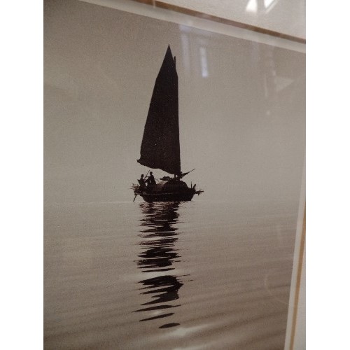 385 - PAIR OF CONTEMPORARY 'MODERN SEPIA' PICTURES. SMALL BOATS ON CALM WATER. WIDE BLACK FRAMES.