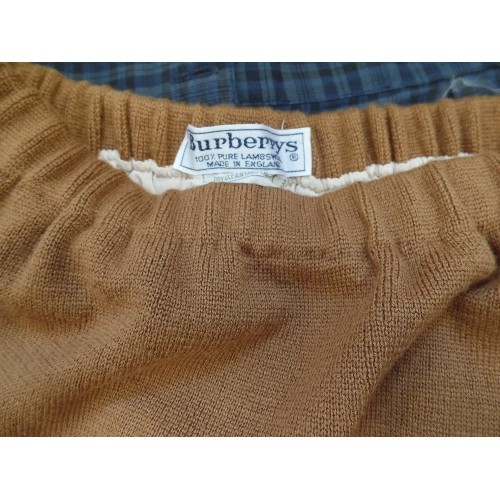 404 - VINTAGE BURBERRY WOMENSWEAR. INCLUDES 2 X SKIRTS, & A PAIR OF TAILORED SHORTS.