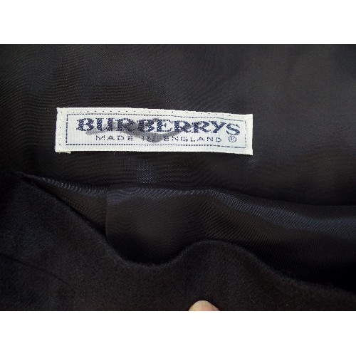 404 - VINTAGE BURBERRY WOMENSWEAR. INCLUDES 2 X SKIRTS, & A PAIR OF TAILORED SHORTS.