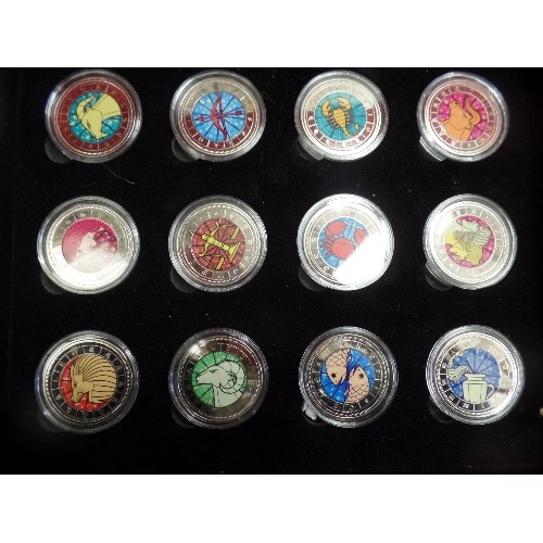 38 - LIMITED EDITION BOXED SET OF 12 ZODIAC SIGNS COINS  BY WESTMINSTER - WITH EXPLANATORY LEAFLET