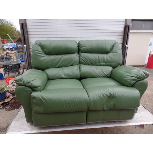 551 - GREEN FAUX LEATHER MANUAL RECLINING 2 SEATER SETTEE