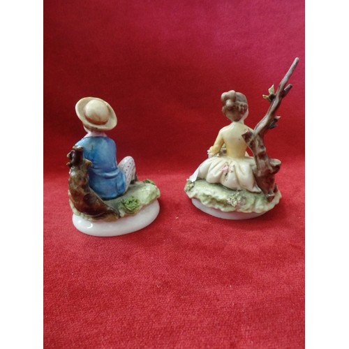 62 - PAIR OF REGENCY STYLE GIRL AND BOY FIGURES, BOY HOLDING A DOVE AND GIRL A BOUQUET.  DAMAGE TO GIRL'S... 