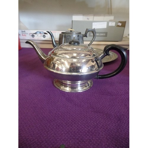 64 - SILVER PLATED TEAPOT AND PEWTER TEAPOT WITH BONE KNOB ON LARGE CIRCULAR TRAY