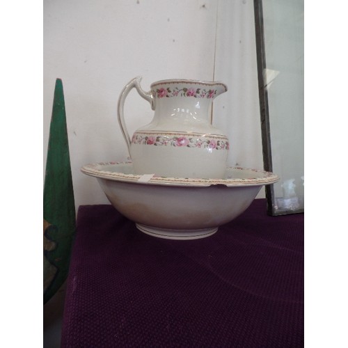 99 - WASH JUG AND BOWL SET, WHIE WIH PINK ROSE EDGING.  LARGE NIBBLE OUT OF THE BOWL