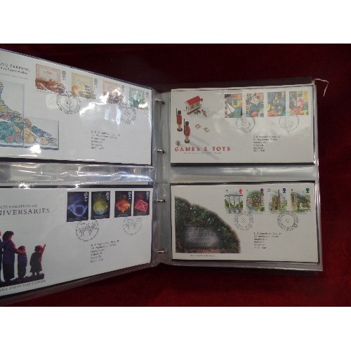 105 - FOLDER OF ROYAL MAIL FIRST DAY COVERS