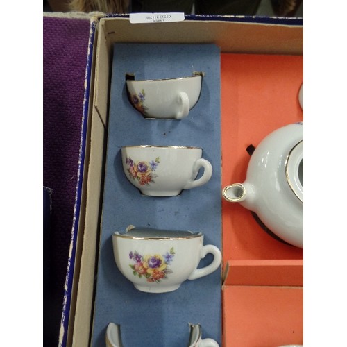 113 - CHINA CHILDS TEA SET COMPLETE AND BOXED, FOR FOUR