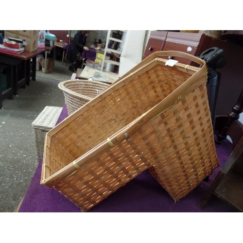 119 - A RATTAN STEP BASKET WITH TAGS  BY  LILIAN BERNIN.  ALSO A SMALL WOVEN PAPER BASKET