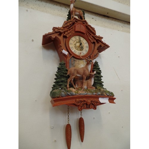 130 - AUSTRIAN STYLE BATTERY CLOCK - VERY DECORATIVE WITH STAGS (HORN MISSING)