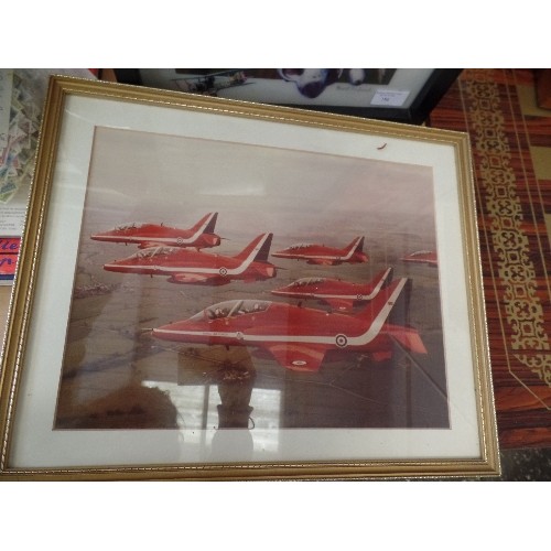 186 - TWO FRAMED AND GLAZED AIRCRAFT PICTURES - ONE OF THE RED ARROWS AND THE OTHER OF PLANES THROUGH THE ... 