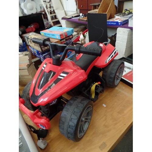 246 - CHILDS RED AND BLACK ELECTRIC POWERS QUAD BIKE