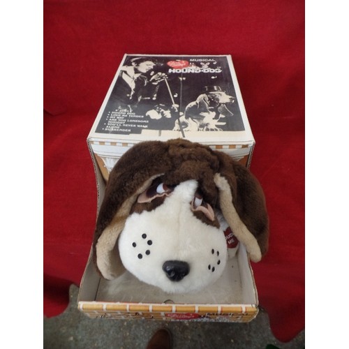 264 - BATTERY OPERATED MUSICAL ELVIS PRESLEY HOUND-DOG