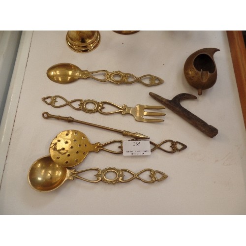 285 - SELECTION OF BRASSWARE - CANDLESTICKS, SPOONS, BELL MINIATURE COMPANION SET