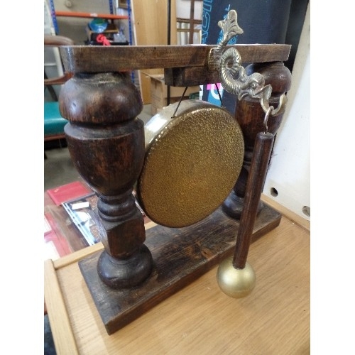 298 - BRASS DINNER GONG AND MALLET ON WOODEN STAND