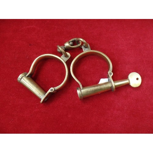 174 - PAIR OF VINTAGE SOLID BRASS HANDCUFFS WITH SCREW KEY