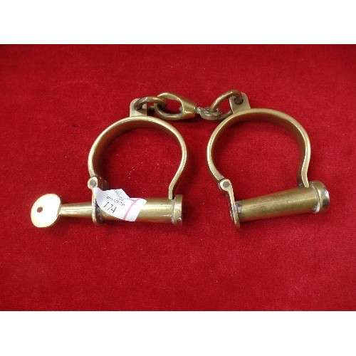 174 - PAIR OF VINTAGE SOLID BRASS HANDCUFFS WITH SCREW KEY