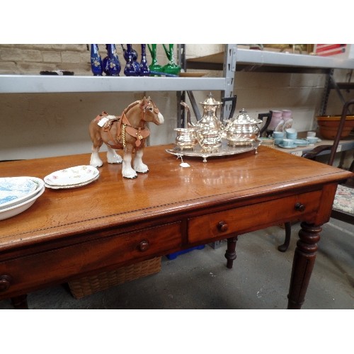 104 - AN EARLY VICTORIAN MAHOGANY SIDE TABLE WITH TWO DRAWERS ON TURNED AND FLUTED LEGS - 137CM X 67CM X 8... 