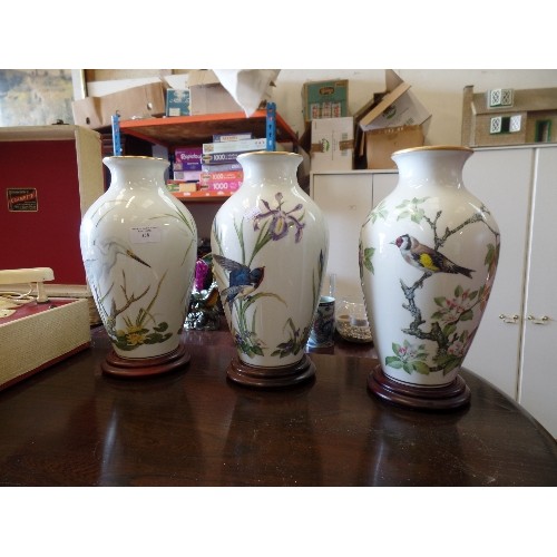 358 - 3 X LARGE COLLECTABLE PORCELAIN VASES ON WOODEN PLINTHS. BY FRANKLIN PORCELAIN. INC THE MARSHLAND BI... 