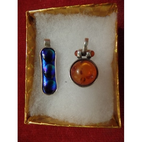 18 - 2 SILVER PENDANTS 1 AMBER THE OTHER BRIGHT BLUE STONE