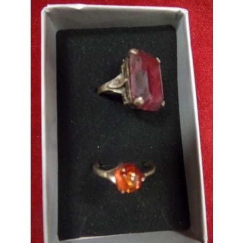 14 - 2 SILVER RINGS 1 WITH AMBER SIZE T THE OTHER WITH AMETHYST SIZE K