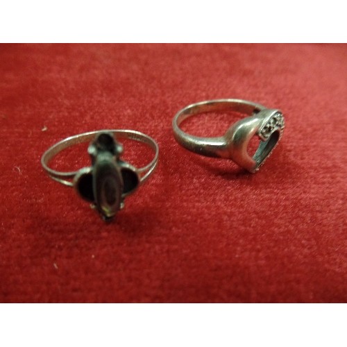 11 - 2 SILVER RINGS 1 HEART SHAPE WITH WHITE STONES THE OTHER MEXICAN WITH ABALONE SHELL