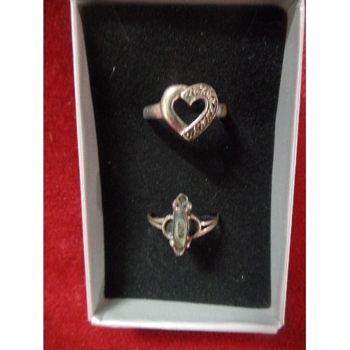 11 - 2 SILVER RINGS 1 HEART SHAPE WITH WHITE STONES THE OTHER MEXICAN WITH ABALONE SHELL