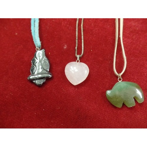 21 - THREE STONE NECKLACES INCLUDING CANADIAN JADE BUFFALO, ROSE QUARTZ HEART AND A GREY STONE BIRD ON A ... 