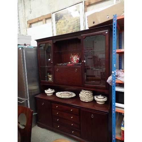 424 - LARGE STAG MINSTREL WALL UNIT, WITH DROP-DOWN GLASS CUPBOARD, DRAWERS, BEVELLED-GLASS DOORED SECTION... 