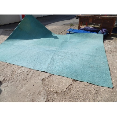 422 - LARGE PALE GREEN RUG, 4M X 3M, IDEAL FOR WORKSHOP ETC AS FADED AND SLIGHTLY STAINED.