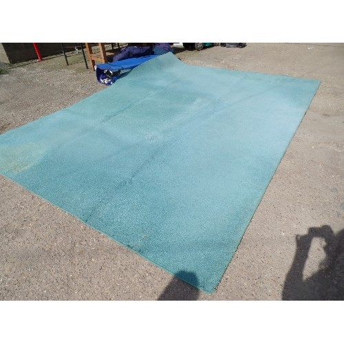 422 - LARGE PALE GREEN RUG, 4M X 3M, IDEAL FOR WORKSHOP ETC AS FADED AND SLIGHTLY STAINED.