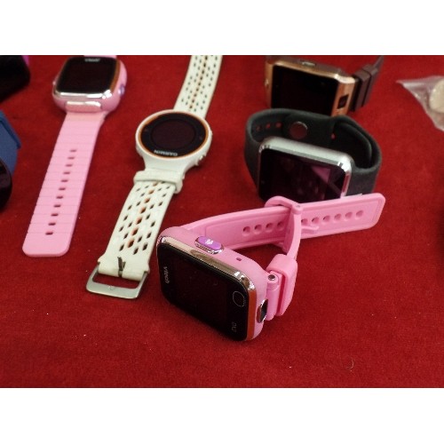 35 - QUANTITY OF CHILDRENS DIGITAL WATCHES - WITH USB AND CHARGER PORTS - SOME APPEAR TO HAVE CAMERAS - P... 