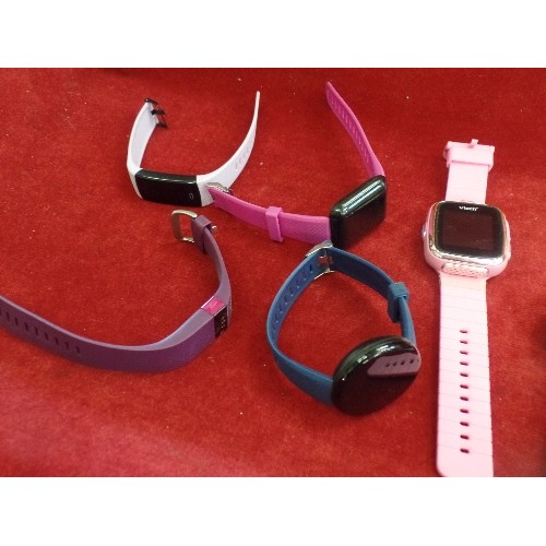 35 - QUANTITY OF CHILDRENS DIGITAL WATCHES - WITH USB AND CHARGER PORTS - SOME APPEAR TO HAVE CAMERAS - P... 