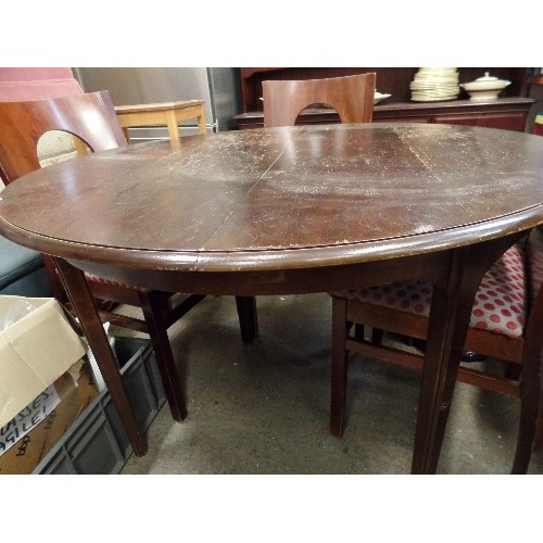 351 - STAG EXTENDABLE DINING TABLE. CIRCULAR, EXTENDS TO OVAL.