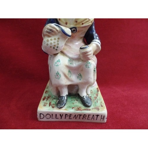 8 - A STAFFORDSHIRE EARTHENWARE FIGURE OF DOLLY PENTREATH ON A SQUARE BASE - MARKED 1753 TO BACK. SAID T... 