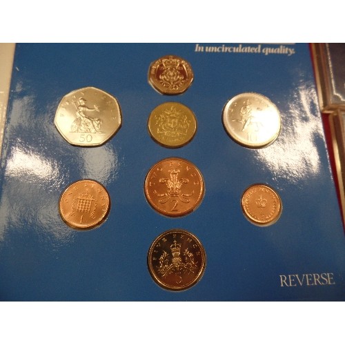 29 - TWO SETS OF 1983 UNCIRCULATED BRITISH COINS AND TWO ISLE OF MAN ONE POUND PIECE COINS