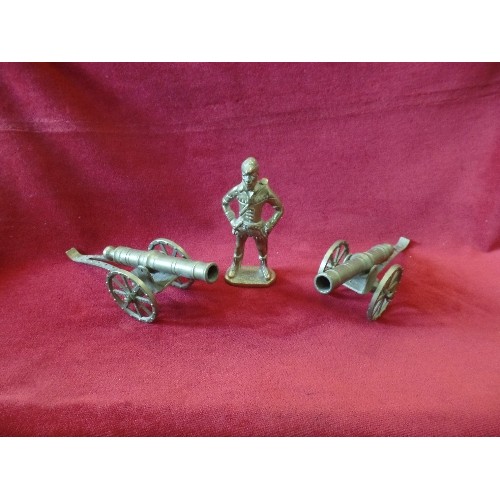 47 - PAIR OF BRASS CANNONS AND A BRASS SOLDIER