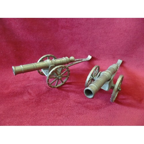 47 - PAIR OF BRASS CANNONS AND A BRASS SOLDIER