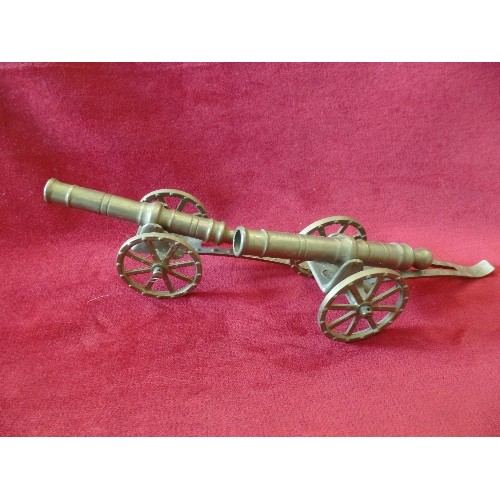 47 - PAIR OF BRASS CANNONS AND A BRASS SOLDIER