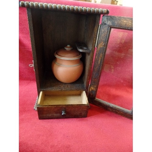 54 - TOBACCIANA INCLUDING AN OAK SMOKERS CABINET WITH TERRACOTTA TOBACCO JAR, TWO BLACK FOREST PIPES, ONE... 